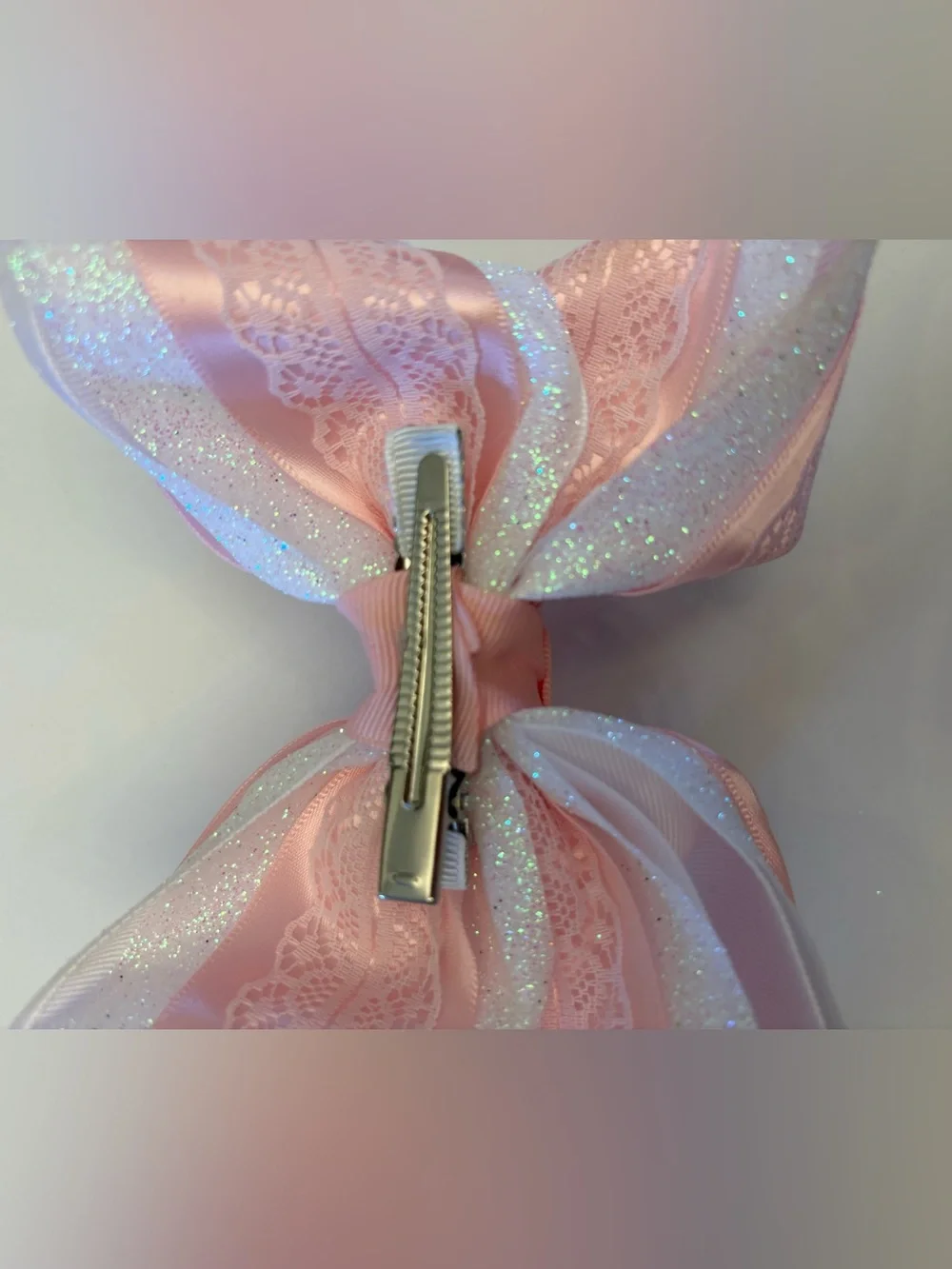 Lynlee Blair's Pink and white glitter bow